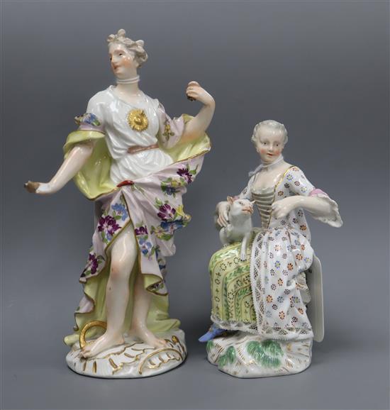 A 19th century Meissen figure of a seated lady feeding a cat and a Meissen allegorical figure, c.1750 (damage and losses)